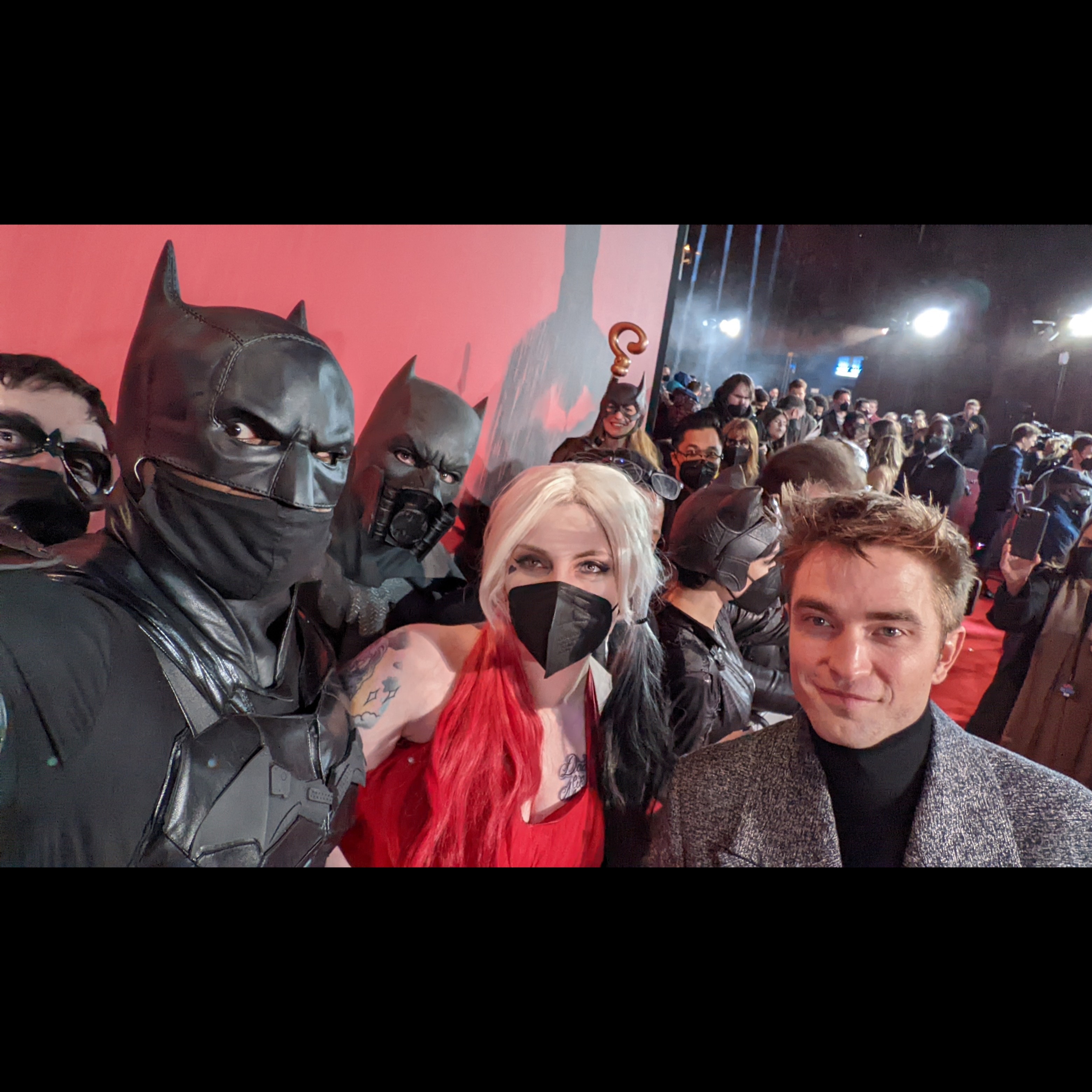 Batman cosplay group with Robert Pattinson at The Batman premiere